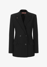 Schwarze, taillierte High‑Performance‑Jacke im Blazer Style mit Knopfverschluss, aus leichtem, elastischem Active‑Material. Die Jacke hat zwei aufgesetzte Fronttaschen, eine Brusttasche, Rücken‑Schlitz und ist innen teilgefüttert. Zweireihiges Modell vor neutral hellem Hintergrund